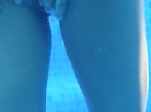 Underwater strip of beautiful tits